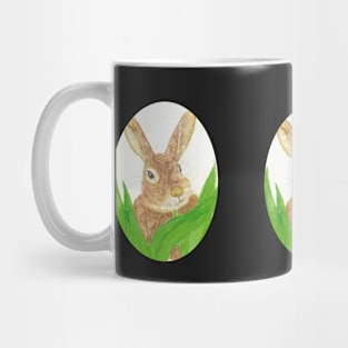 Easter bunny in the grass, oval shape Mug